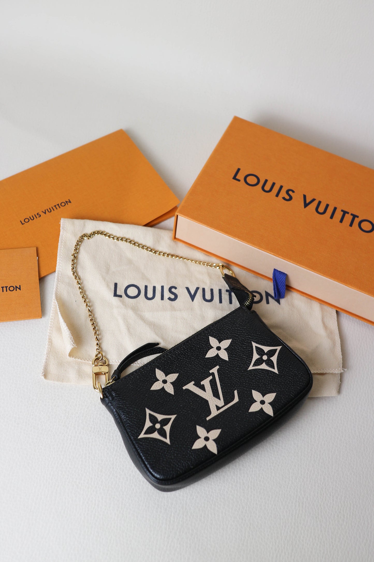 Louis Vuitton Empreinte Mini Pochette Accessoires