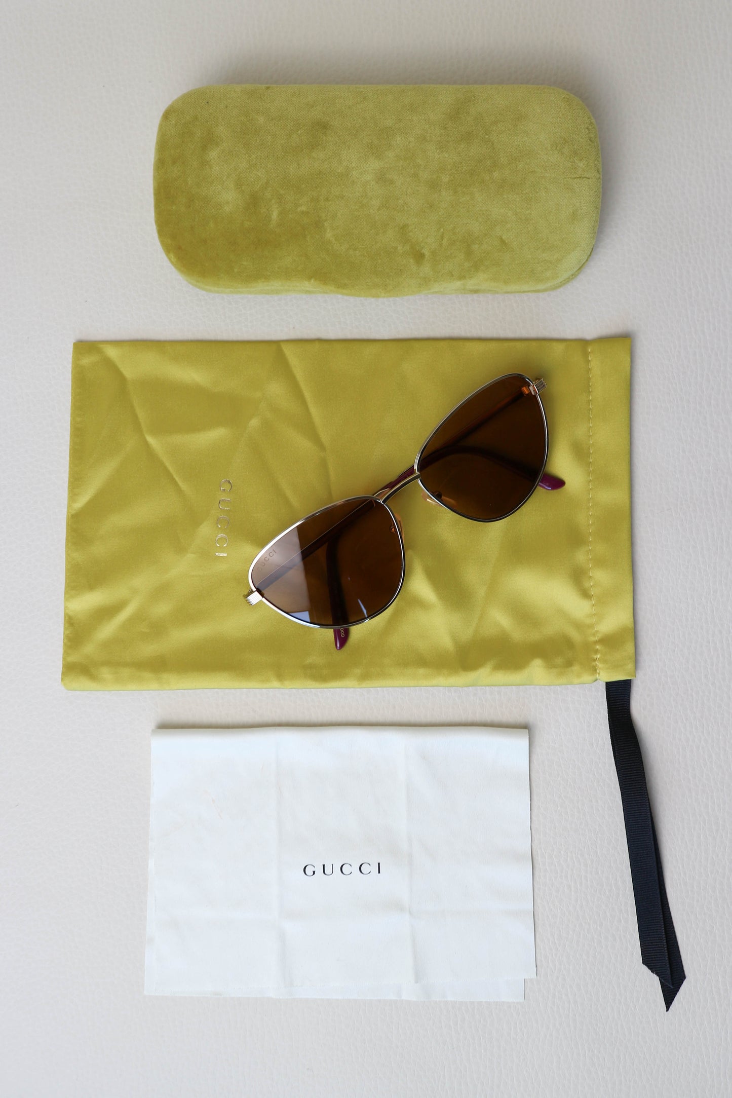 Gucci Cat Eye Sunglasses Gold