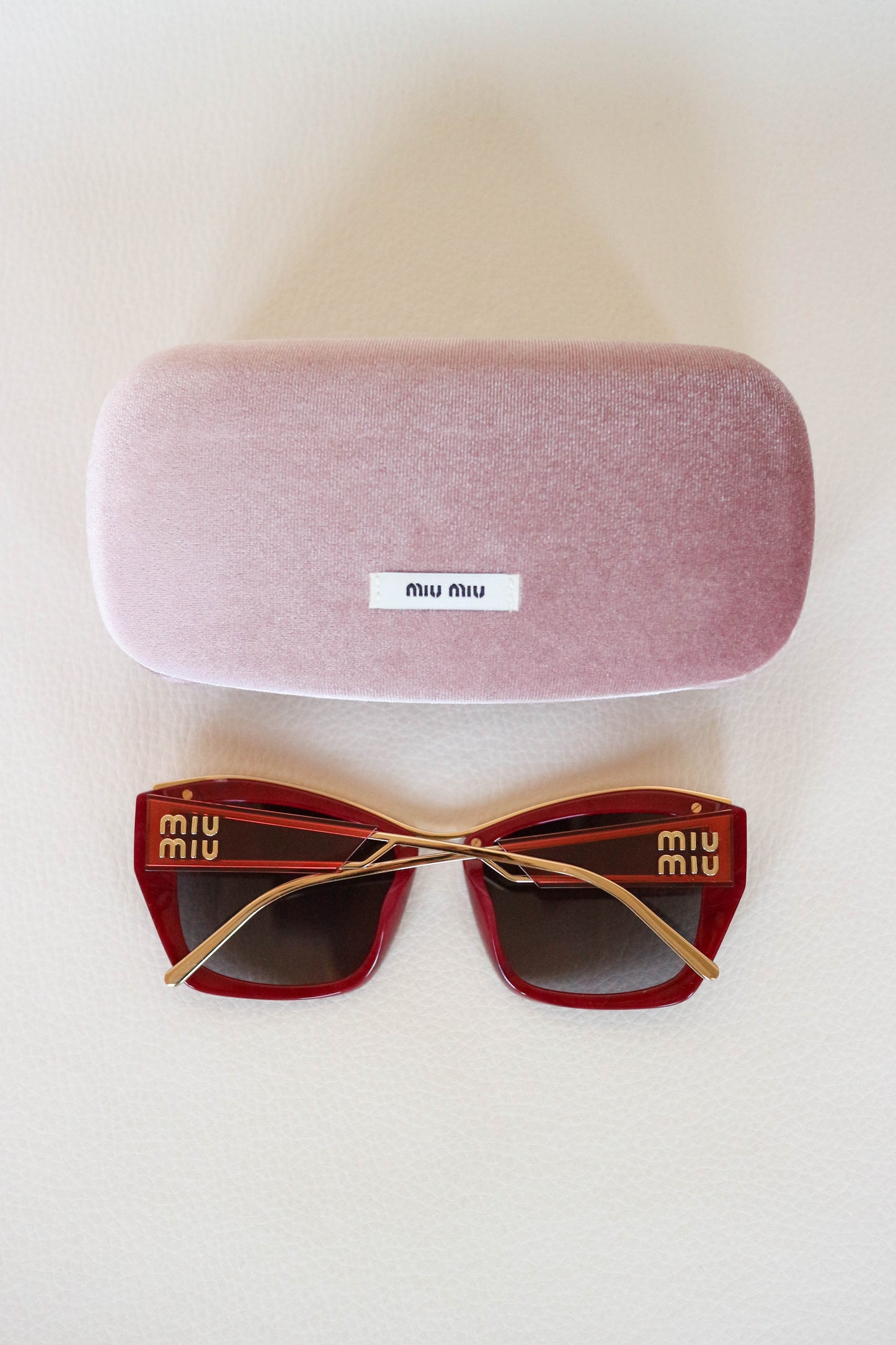 Miu Miu Cat Eye Sunglasses Red