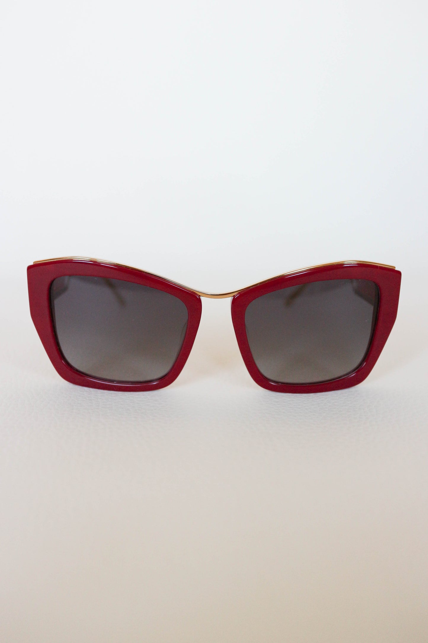 Miu Miu Cat Eye Sunglasses Red