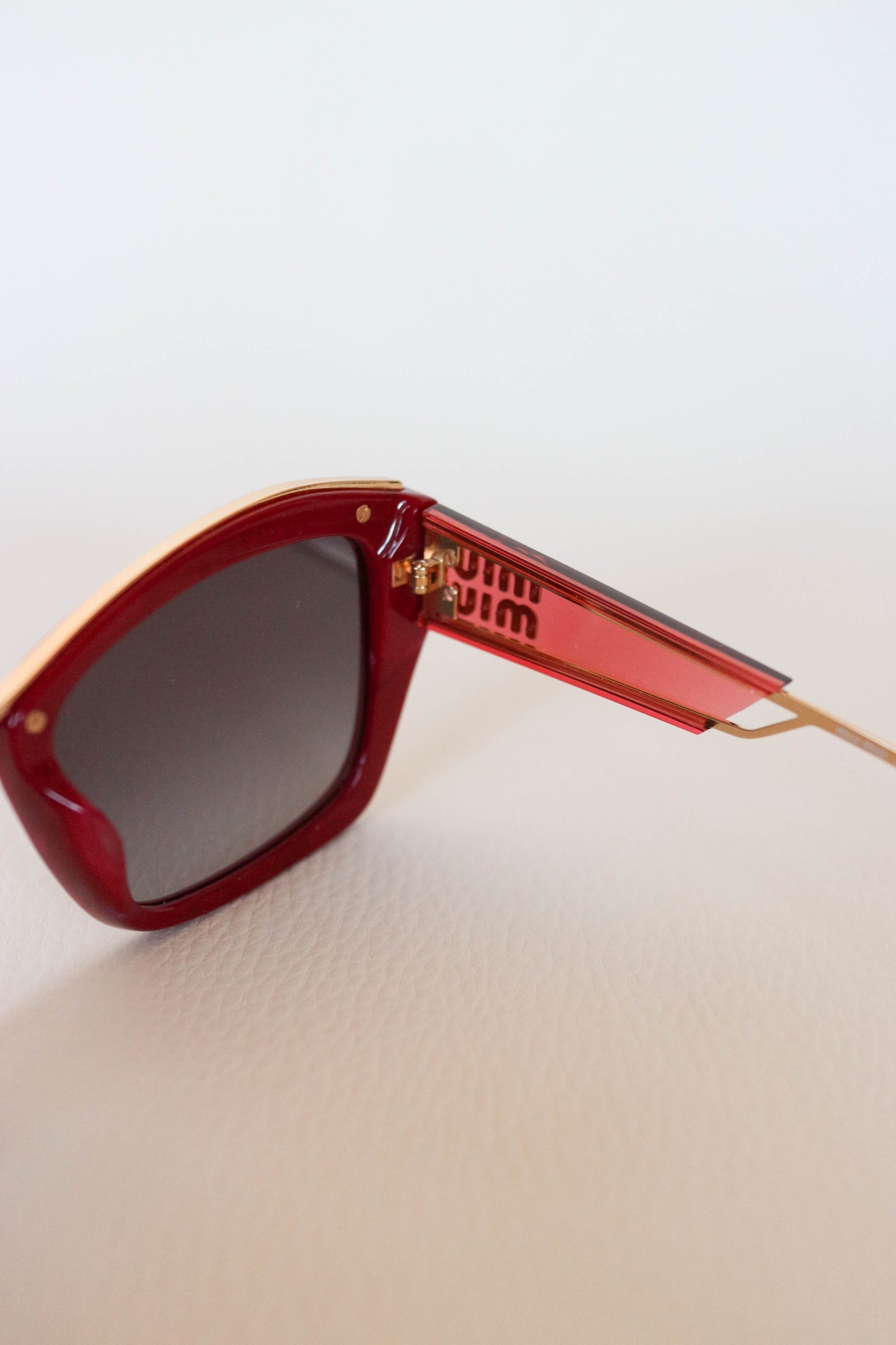 Miu Miu Cat Eye Sunglasses Red