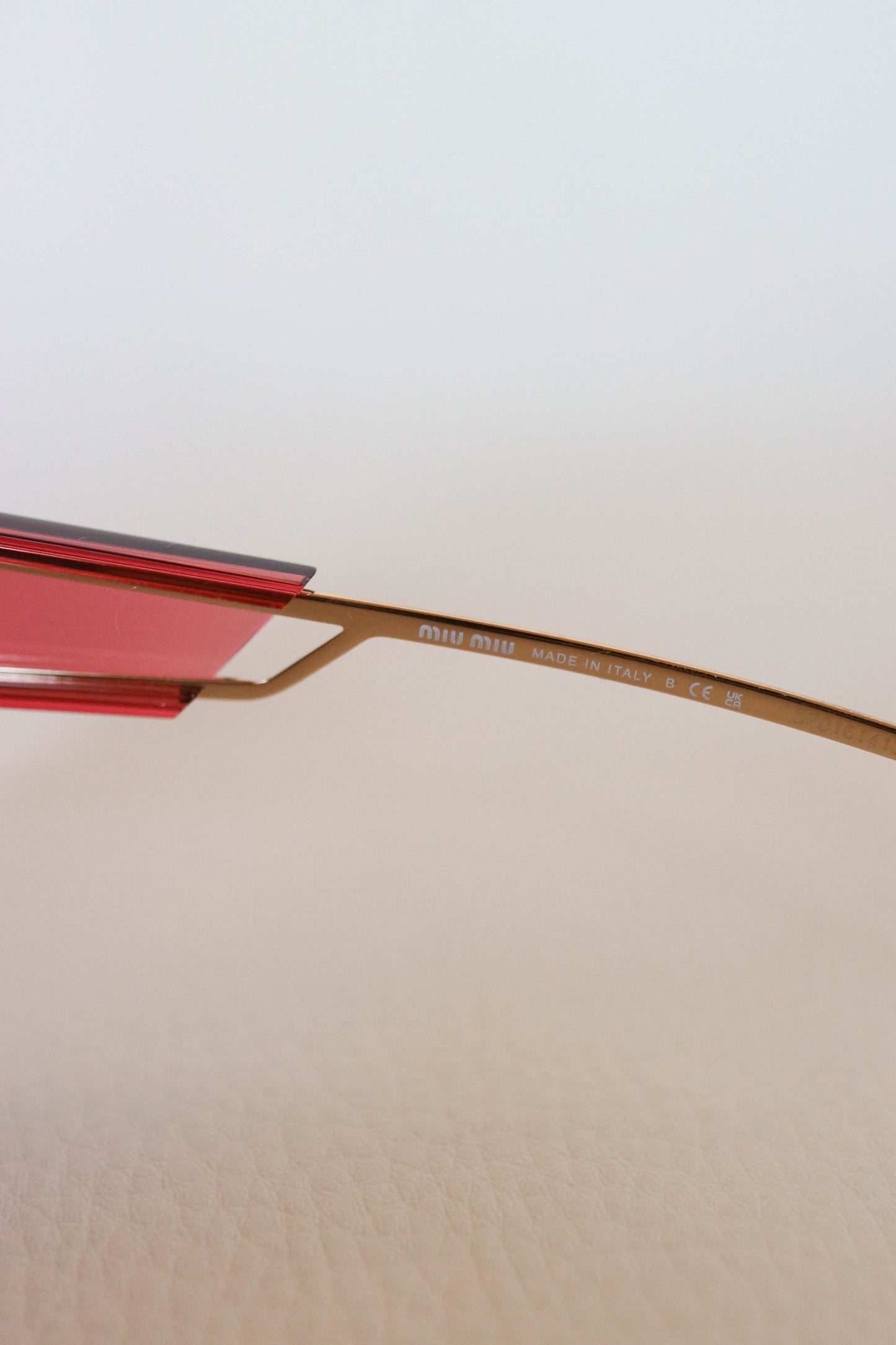 Miu Miu Cat Eye Sunglasses Red