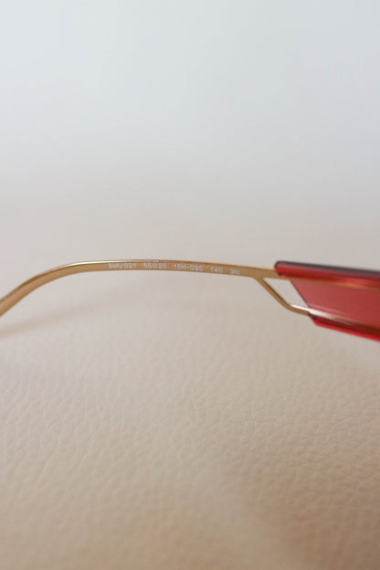 Miu Miu Cat Eye Sunglasses Red