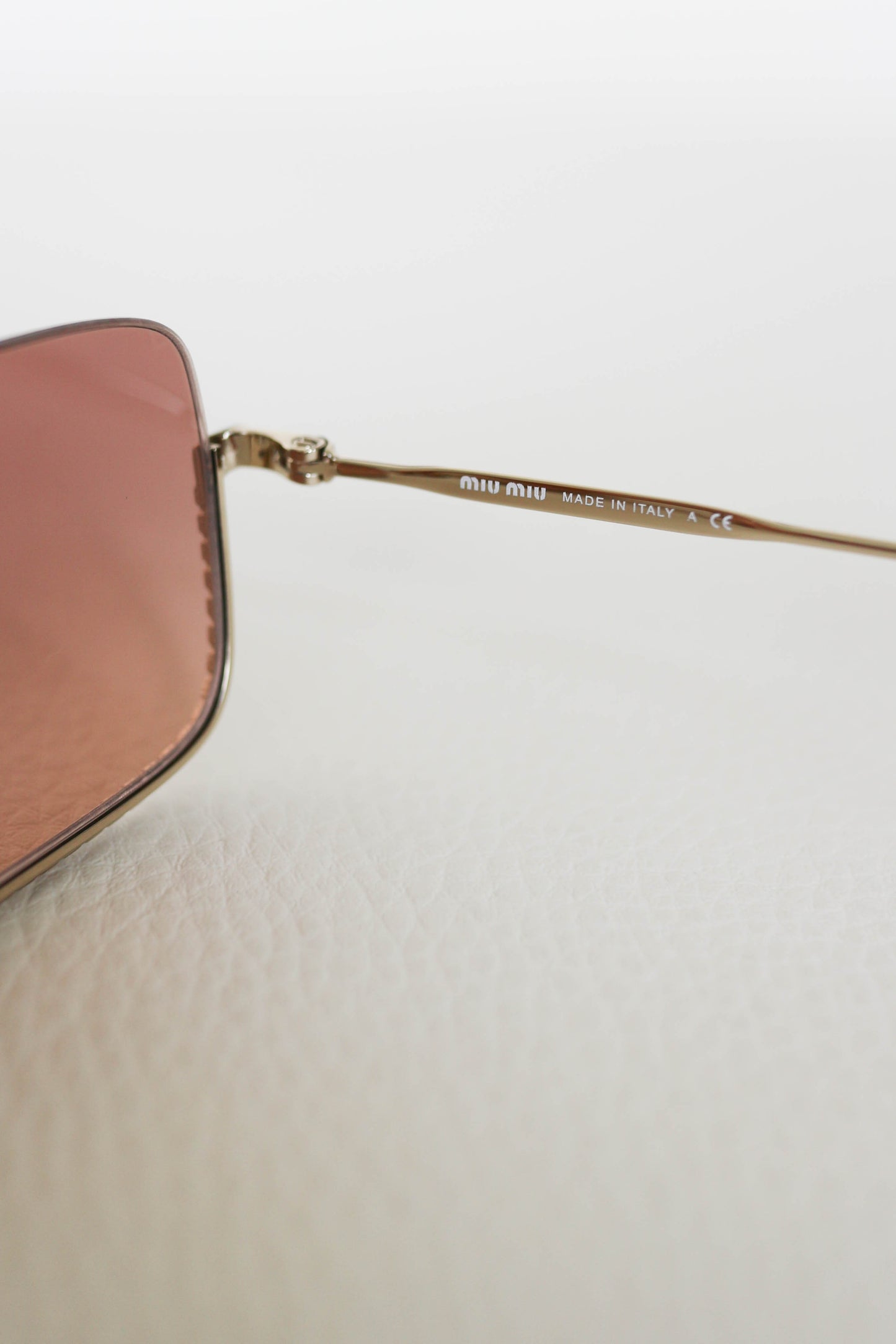 Miu Miu Tinted Crystal Sunglasses Gold