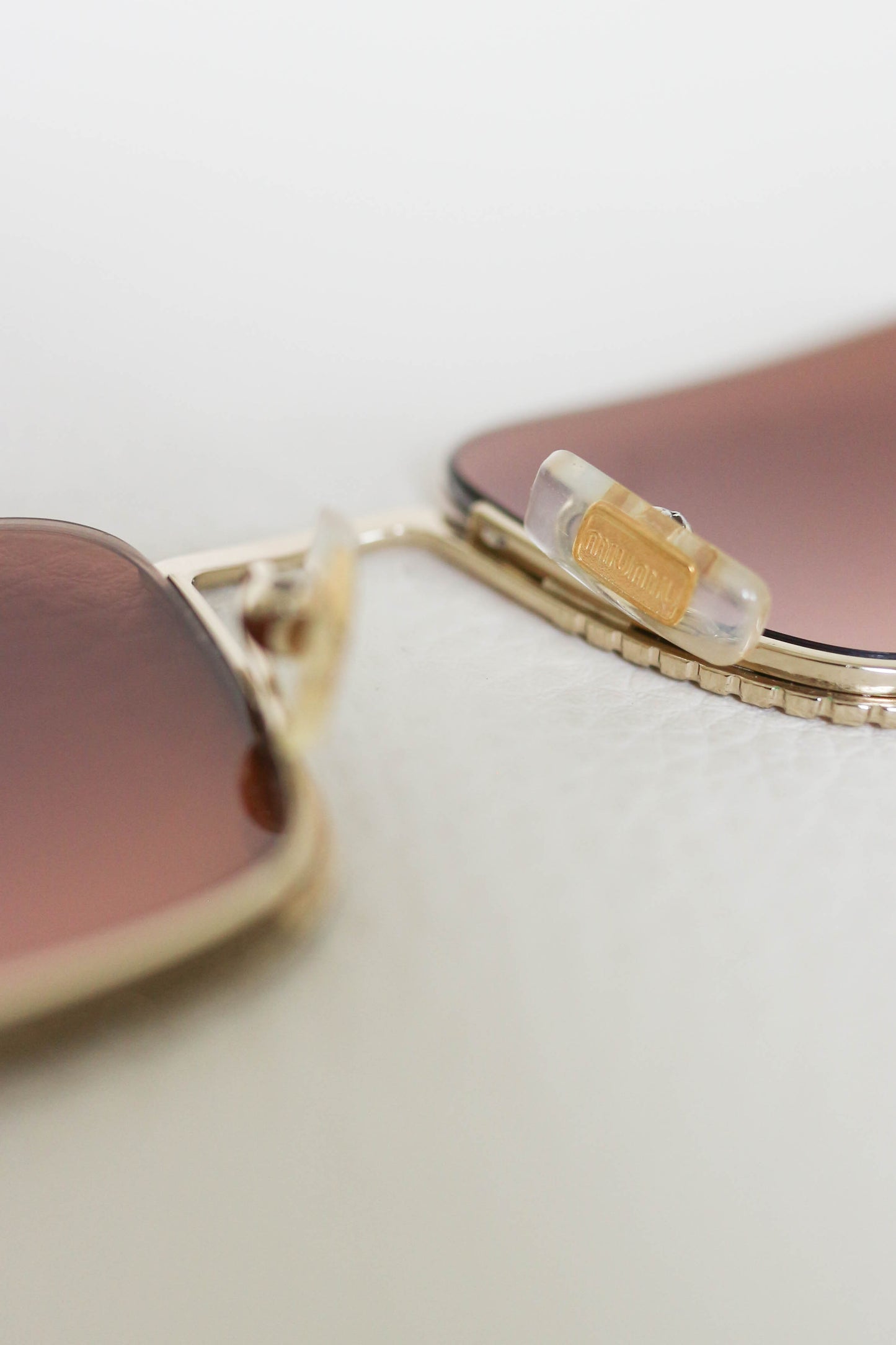 Miu Miu Tinted Crystal Sunglasses Gold