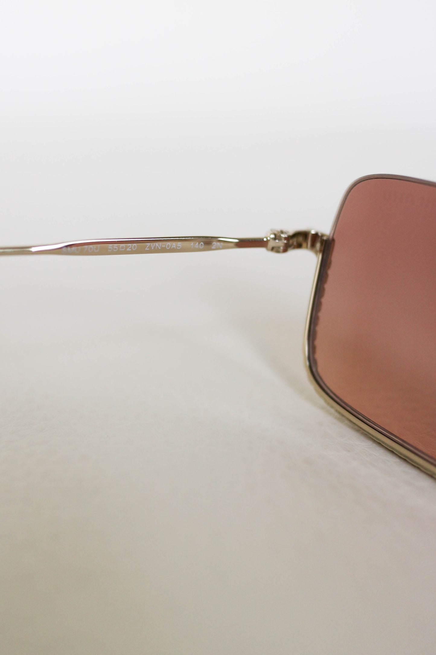 Miu Miu Tinted Crystal Sunglasses Gold