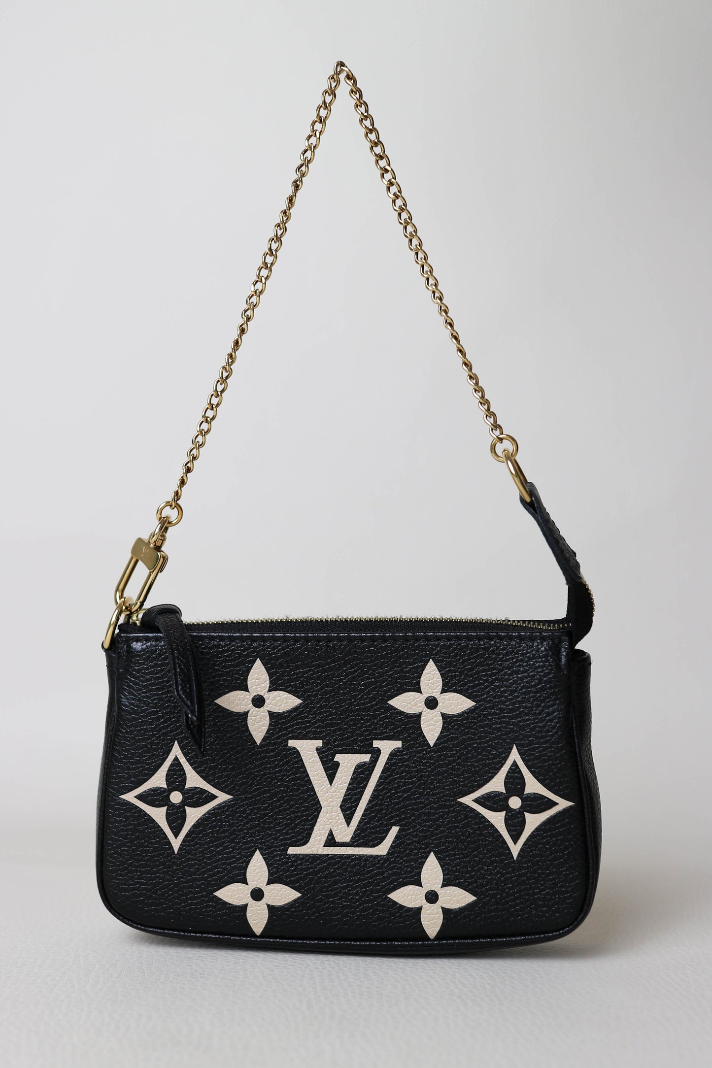 Louis Vuitton Empreinte Mini Pochette Accessoires