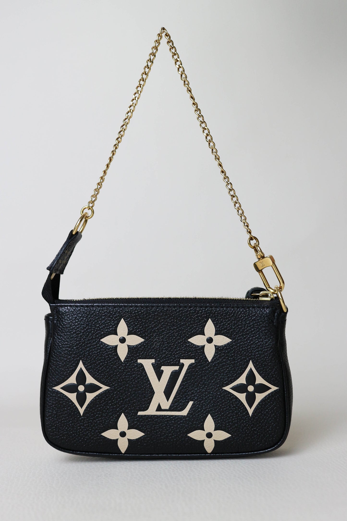 Louis Vuitton Empreinte Mini Pochette Accessoires