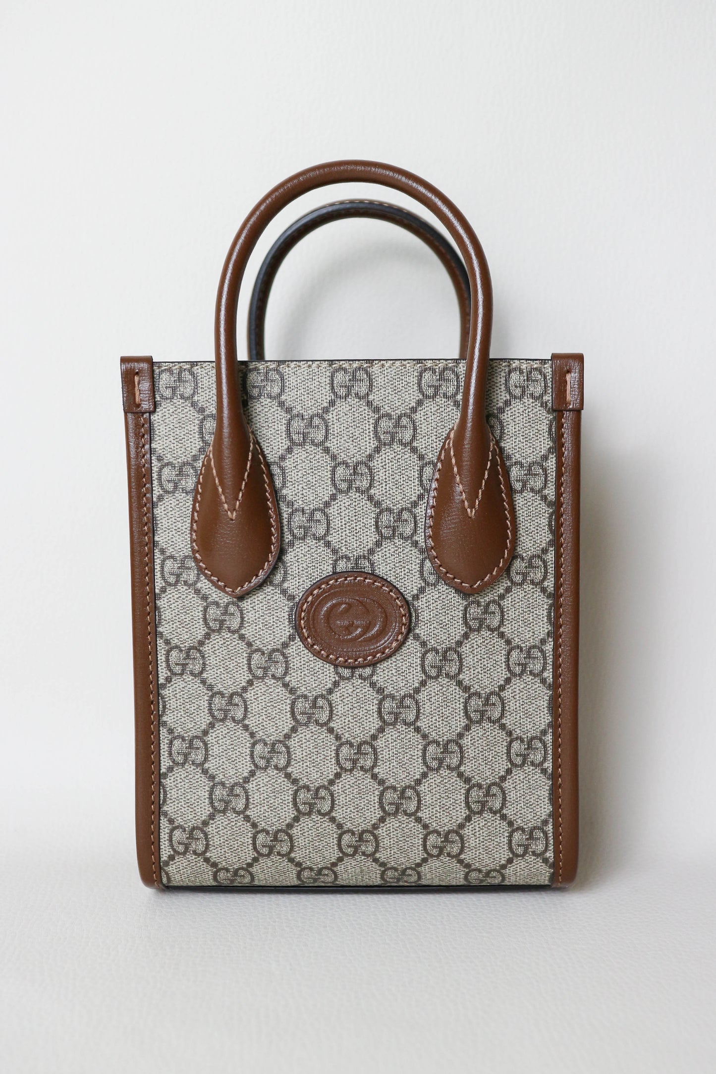 Gucci Monogram Canvas Top Handle Mini Bag