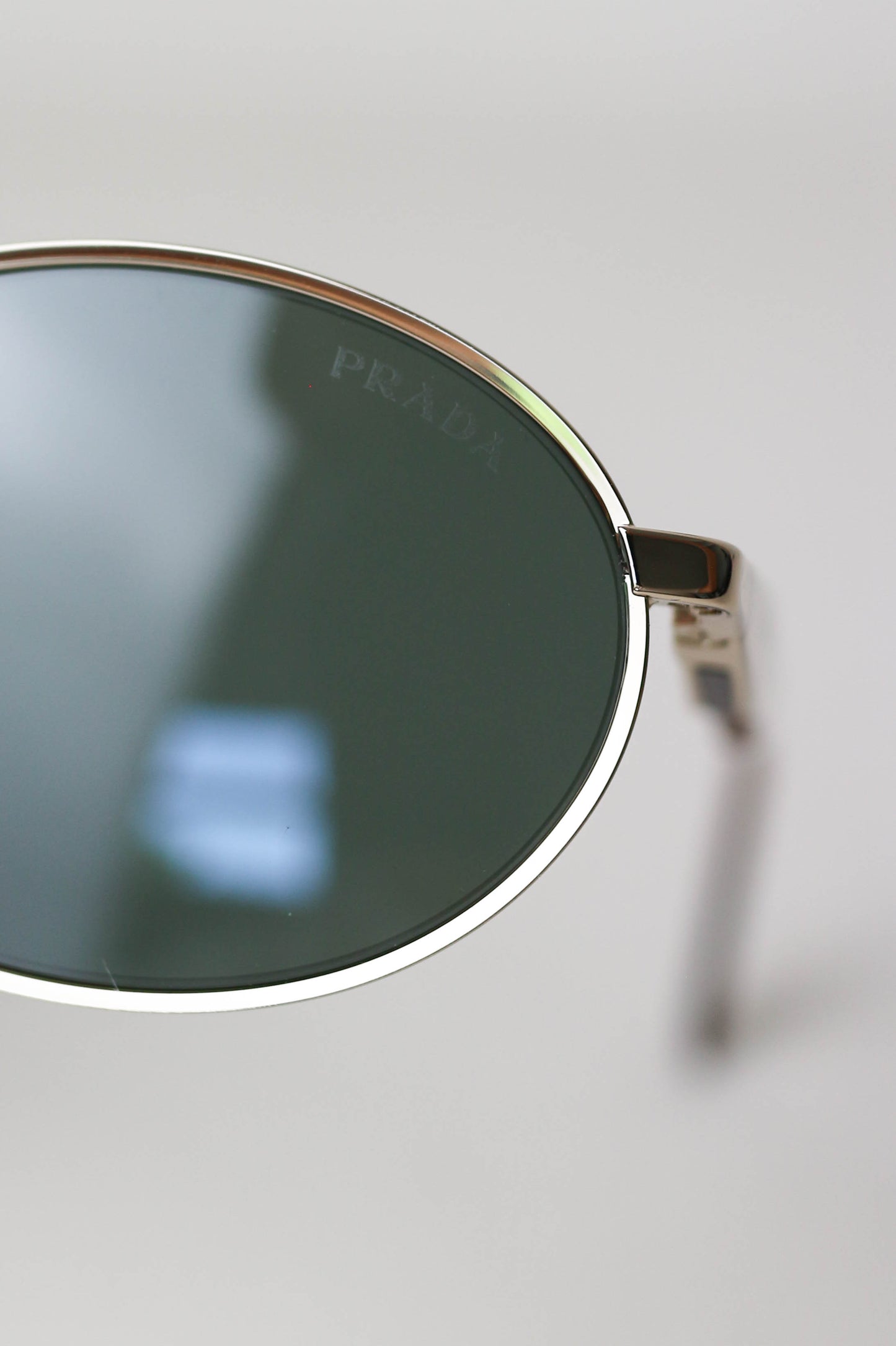 Prada Logo Oval Sunglasses Gold
