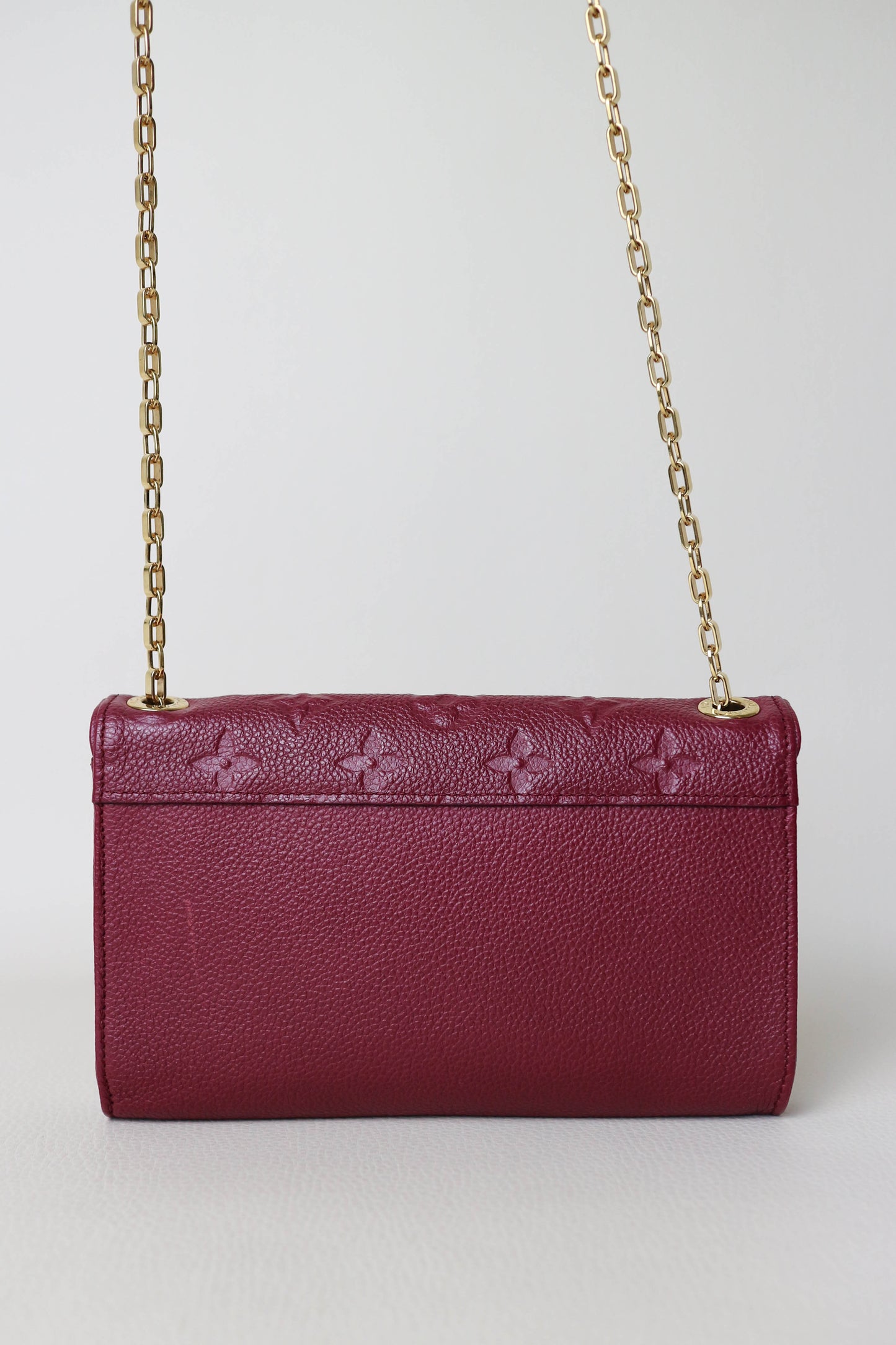 Louis Vuitton Empreinte Pochette Bag Burgundy